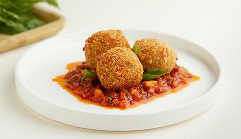 Polpette di pane amb formatge edam i salsa bolonyesa vegetal